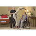 Bestcare PL182 electric mobile lift with person in sling in new condition
