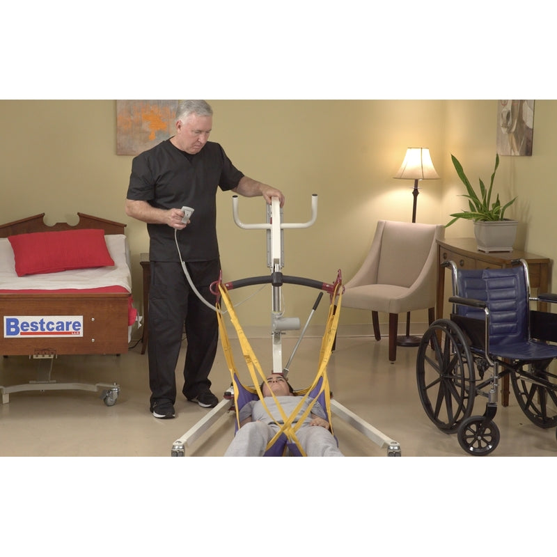 Bestcare PL182 electric mobile lift with person on the floor in new condition