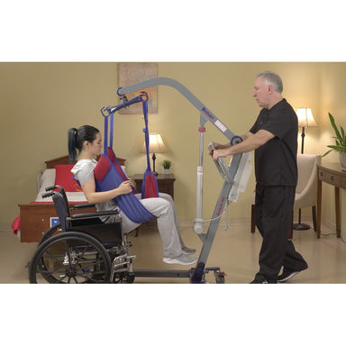 Bestcare ProCare PL500 full electric mobile lift with person in sling in new condition