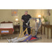 Bestcare ProCare PL500 full electric mobile lift with person in sling on floor in new condition