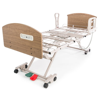 Hospital bed with wooden side rails on a white background