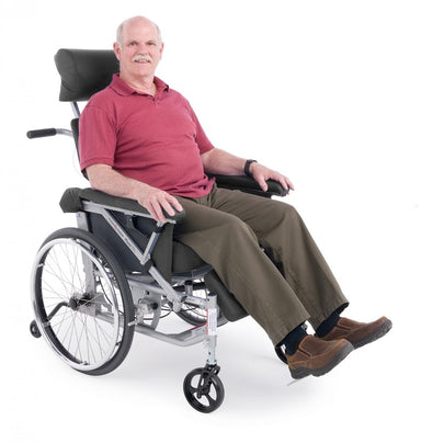 Person sitting in a Graham-Field PureTilt wheelchair in use